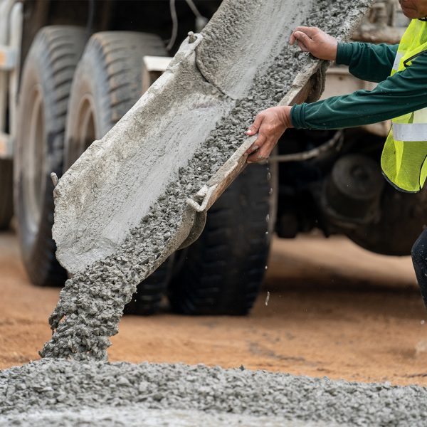 construction-worker-pouring-wet-concret-road-construction-site